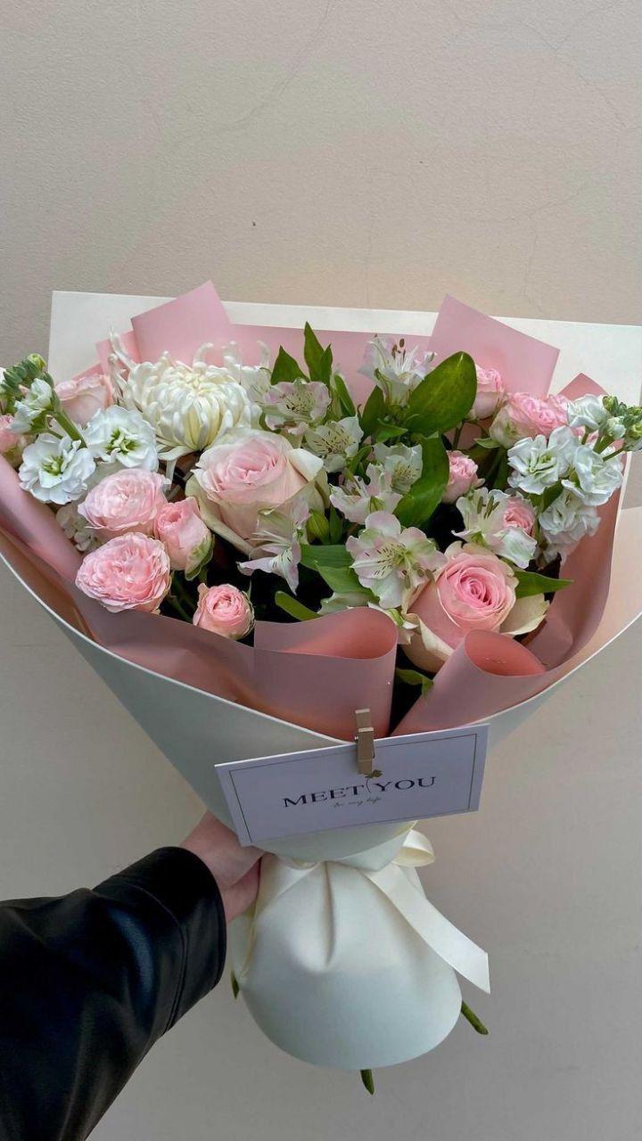 Professional floral arrangement in modern corporate setting